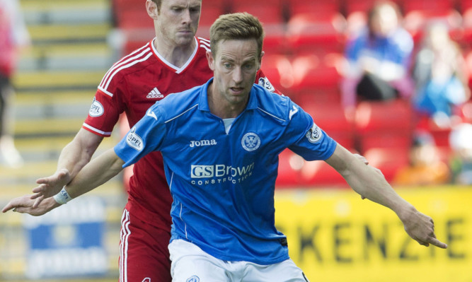 Steven MacLean playing against Aberdeen earlier in the season.