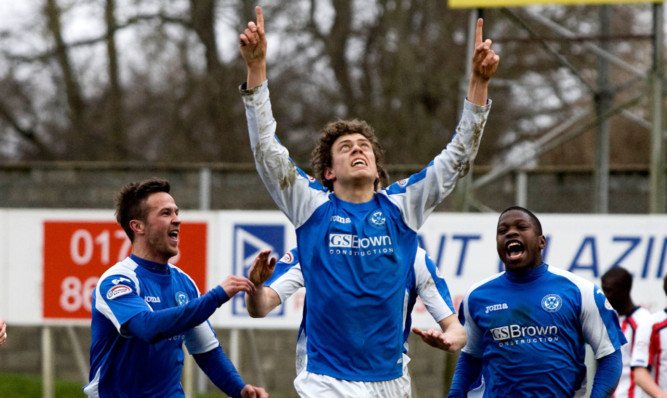 St Johnstone ace Murray Davidson celebrates after opening the scoring for the home side.