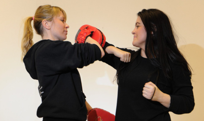 Class member Lorraine Bairstow and instructor Val Duguid.