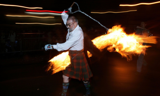 The fireball ceremony is a traditional part of Stonehavens New Year celebrations.