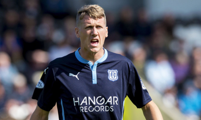 Jim McAlister in action for Dundee