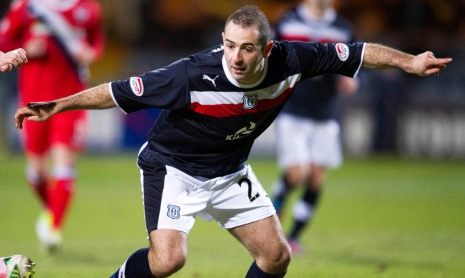 Gary Harkins in action for Dundee.