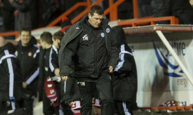 St Johnstone manager Tommy Wright heads for the tunnel.