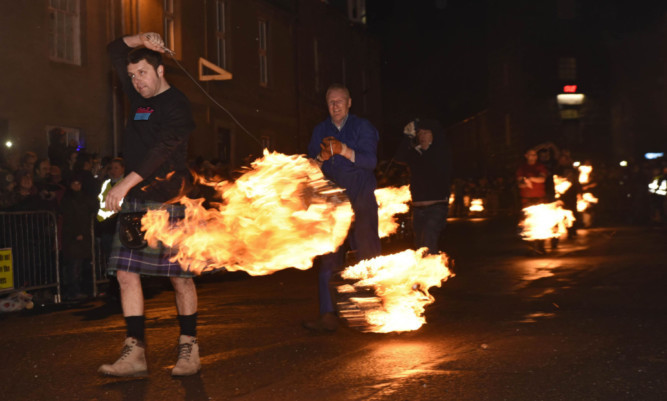 Fireballs swingers parading up and down the High Street.