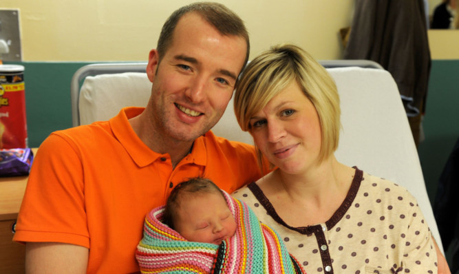 Aoife Marie with parents Kerry and Steven.