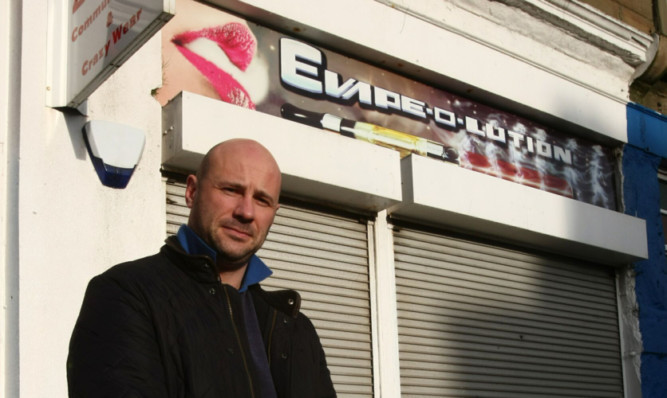 Derek Wann outside the now-closed shop at Brothock Bridge in Arbroath.