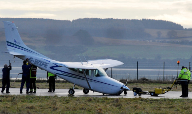 The light aircraft that crashed after its front wheel collapsed on landing last December.