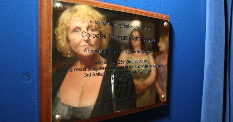 Kris Miller, Courier, 21/06/10, News. Picture today at Dunfermline High School. A plaque in memory of Corporal Tam Mason who was fatally wounded in Afghanistan last year was unveiled today. Pic shows Tam's mother, Linda Buchanan (reflecting) reflected in the newly unveiled plaque.