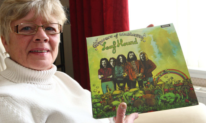 Lynn Grant with husband Roys album, which has attracted bids of more than £1,400.