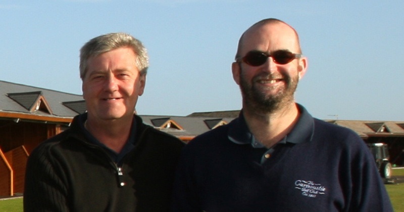 Pictured at the driving range at St. Andrews, are Jim Gales, right, and Paul Shepherd with the Sidey Cup, the trophy for the Scottish Pan Disability Open Golf Championship, and those who turned up for the open day.