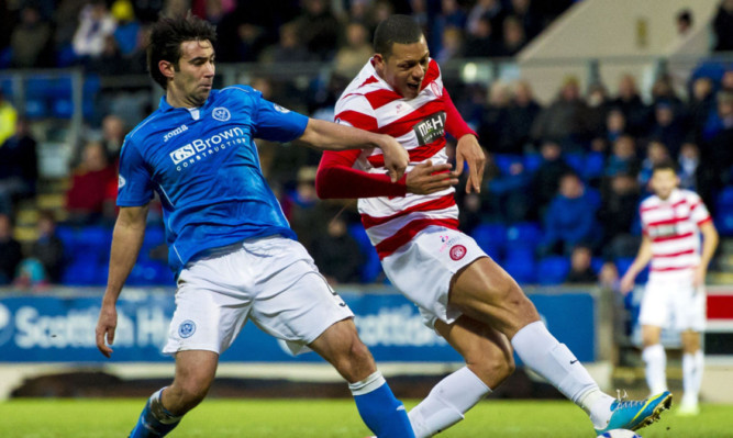 St Johnstone's Simon Lappin (left) challenges Mickael Antoine-Curier