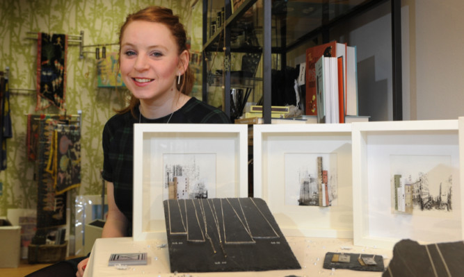 Artist and jeweller Kirsten Manzi with some of her work in the pop-up shop on Reform Street.