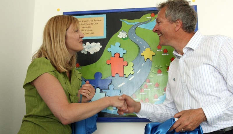 DOUGIE NICOLSON, COURIER, 22/06/10, NEWS.
DATE - Tuesday 22nd June 2010.
LOCATION - Blue Central Resource Base, Dunfermline.
EVENT - Official opening by chef Nick Nairn.
INFO - Nick Nairn after unveiling the plaque, with Rachel Webb - Area Manager Scottish Society For Autism.
STORY BY - Leeza, Dunfermline office.