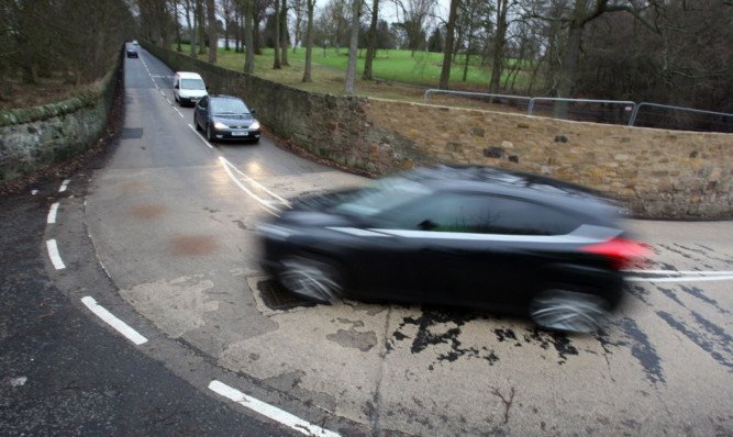 Cars on Lovers Loan and Coal Road, Dunfermline, where a lorry ban is being put forward on the road, which features a tricky 90-degree bend.