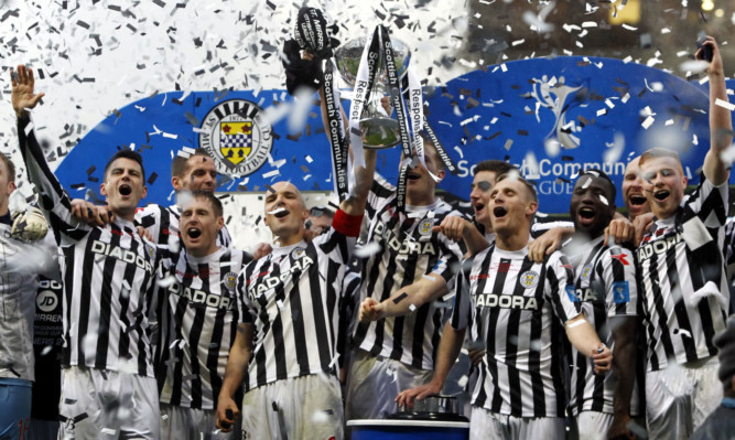 St Mirren players lift the cup after winning the Scottish Communities League Cup Final.