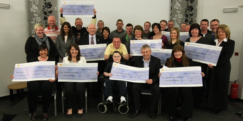 DOUGIE NICOLSON, COURIER, 05/01/11, NEWS.
DATE - Wednesday 5th January 2011.
LOCATION - Carnegie Conference Centre.
EVENT - Multiple cheque presentations from Shell UK Ltd.
INFO - Plant Instilation Manager Alex Baird, 2nd from right front row, with the various cheque recipients.
STORY BY - Dunfermline office.