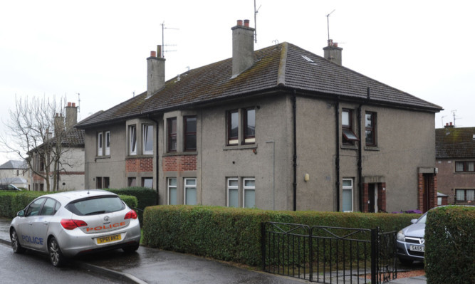 The property on North Bank Street, Monifieth, where Heather Mair died after her sofa caught light.