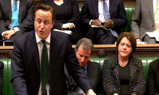 David Cameron speaks to MPs during the emergency debate in the House of Common on the proposals for reforming press regulation.