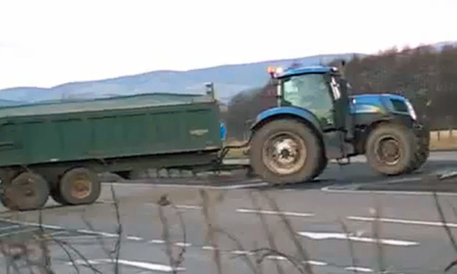 An image from the video showing the difficulty drivers of longer and agricultural vehicles have trying to cross the junction.