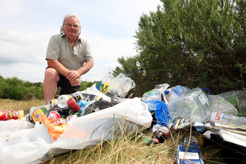 Steve MacDougall, Courier, Burnmouth Fishings, Stanley. Campers have left area in a mess. Pictured, Geordie Stewart beside some of the mess left behind by the campers.
