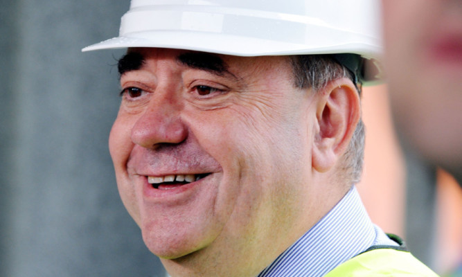 Alex Salmond visiting an oil support vessel in Montrose in 2013.