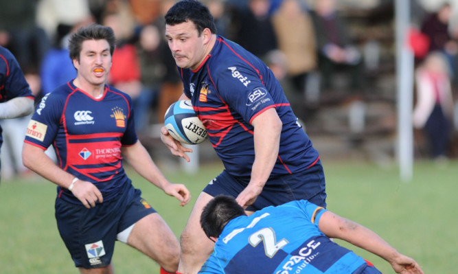 Dundee skipper Alan Brown took time to get to know Japanese ref Shuhei Kobo