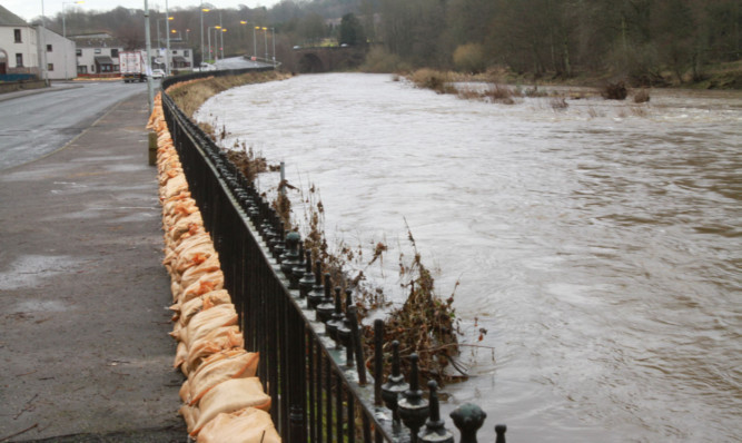 Sandbags on River Street beside the South Esk flowing through Brechin.