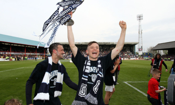 Nicky Riley with the Championship trophy.