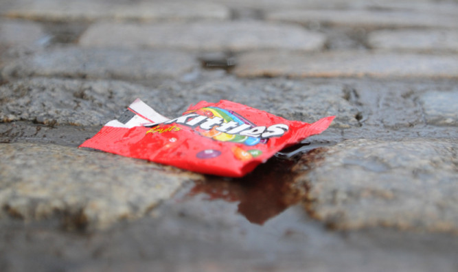 Kim Cessford - 31.01.13 - pictured in the High Street is some dropped litter for the feature on littering
