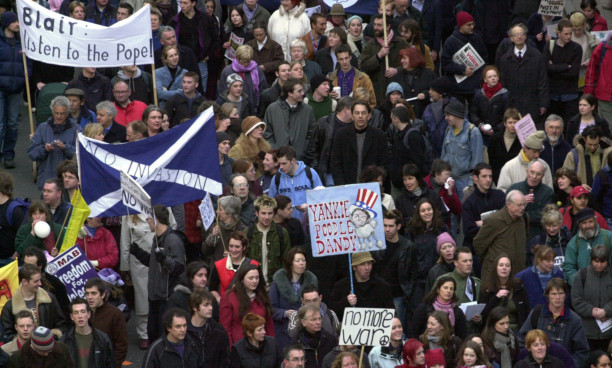Anti-war protesters marching outside the Scottish Parliament in 2003.
