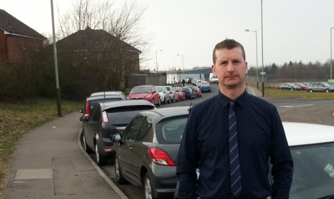 Councillor Dave Doogan in Auld Bond Road.