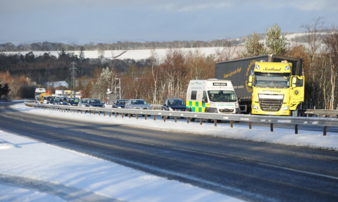 13.01.15 - pictured is the tailback of traffic caused by a jack knifed lorry on the A90 near Inverarity