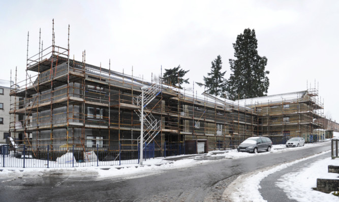 The block of flats at Viewmount in Forfar which is having an insulating cladding applied.