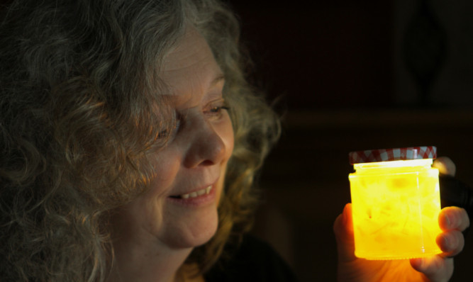 Helen Pass with a jar of her award winning marmalade.