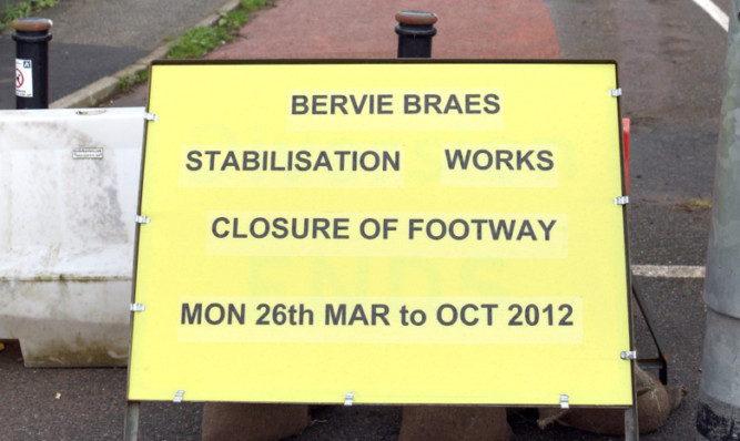 Kris Miller, Courier, 11/04/12. Picture today at Bervie Braes, Stonehaven shows sign warning of closure for stabilisation works over the next seven months.