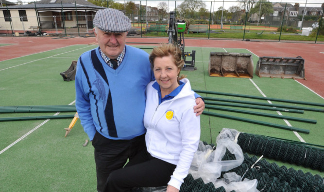 Honorary member Colin Baxter and club secretary Rhona Alston look over the improvemtns being made to the playing surface.