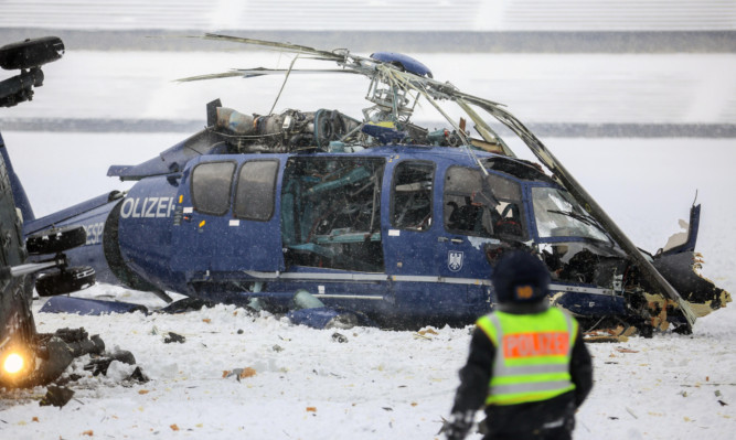 The two helicopters collided as they approached for landing during an exercise by the federal police.