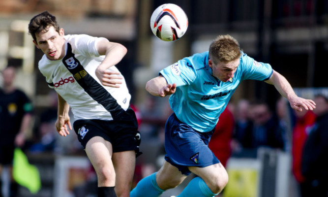 Kyle McAusland, then playing on loan for Ayr United, in action against his new employers Dunfermline last season.