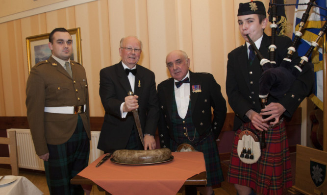 From left: Private Sean Beats, Bob Mitchell, Ronnie Proctor and his grandson Ruaraidh Proctor.