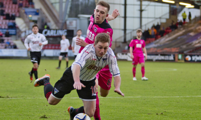Allan Smith is fouled by Scott Stewart as the Pars are awarded a first-half penalty.