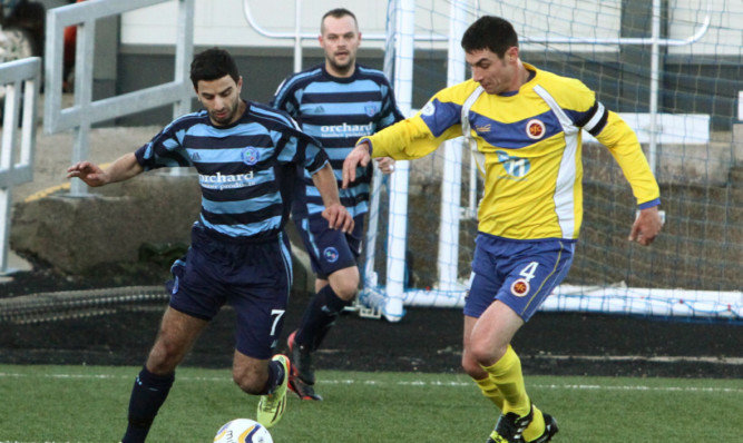 Omar Kader tries to get into the box.