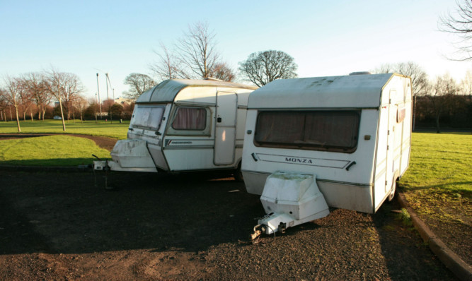 Travellers caravans abandoned at Girvan Gardens, Whitfield.