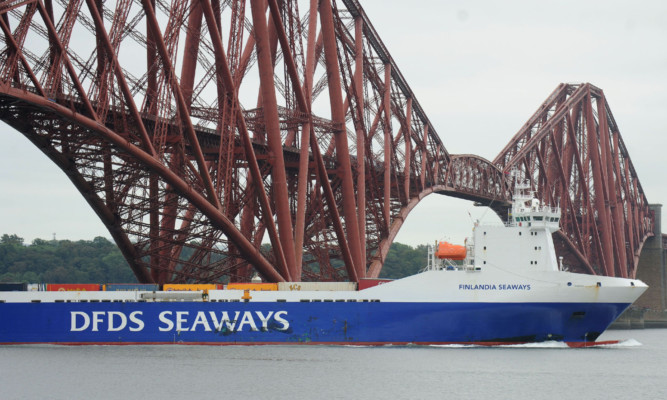 The Finlandia Seaways sails into Rosyth under the Forth Bridge