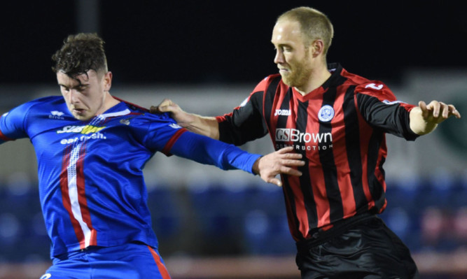 Steven Anderson (right) in action against Inverness on Tuesday night.
