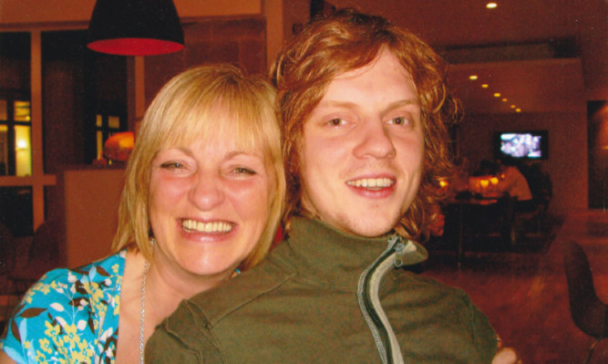 Ross pictured with his mother Sandra.