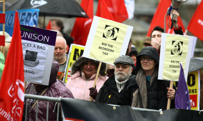 Campaigners have protested against the 'bedroom tax' in Dundee.