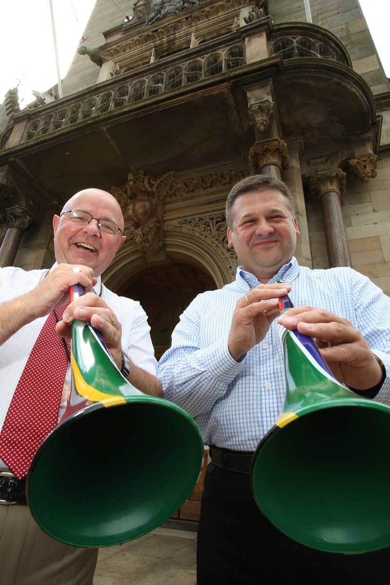 Kris Miller, Courier, 29/06/10, News. Picture today at City Chambers, Dunfermline. Rafal Rosiejak, right, (adopted relative of Councillor Joe Rosiejak) and Councillor Joe Rosiejack are pictured with South African coloured Vuvuzela's. Rafal (who is Hotel Co-ordinator for the 2012 Euro Championships in Poland) has just returned from a trip to the world cup to see how it was organised. See Paul Reoch for story.