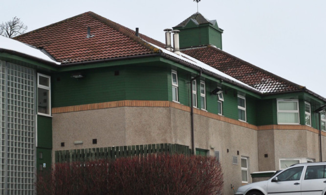 Monroe House care home still has much to do, according to HIS inspectors.