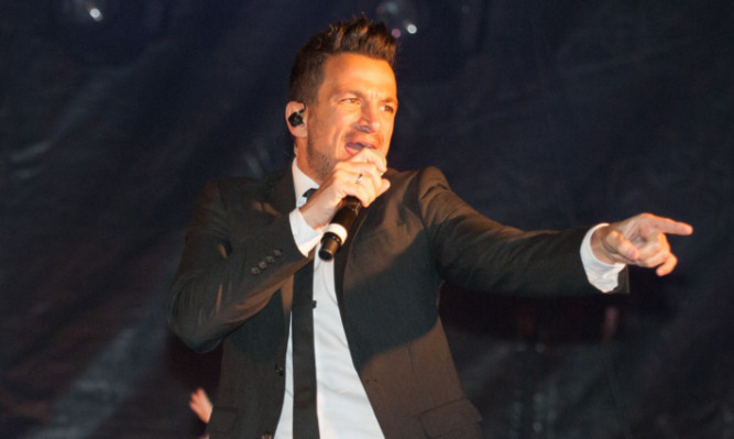 Peter Andre performs at the switch-on.