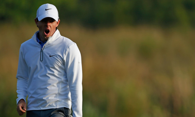 Rory McIlroy shows signs of tiredness during his second round.